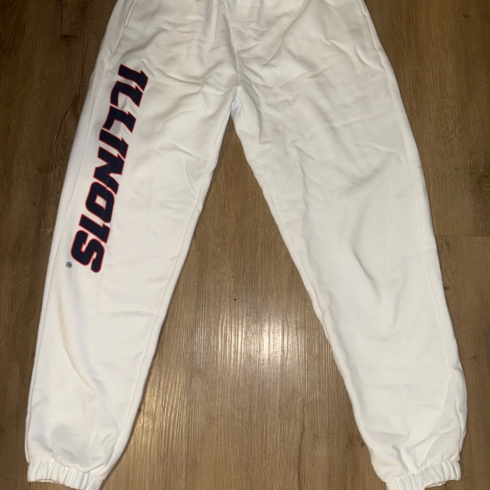 White Joggers with Elastic Cuffs and Bold Graphic